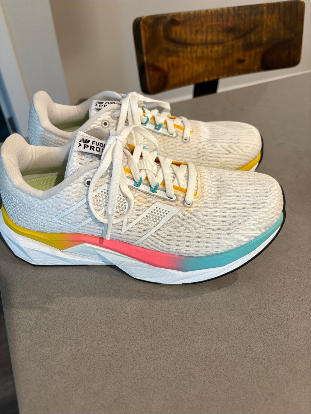 New Balance Women's White Running Shoes with Yellow, Pink & Teal Accents